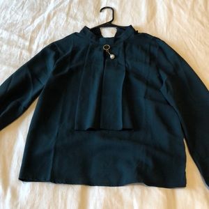 Long sleeved green blouse never worn